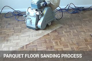 Sanding the parquet blocks before sealing