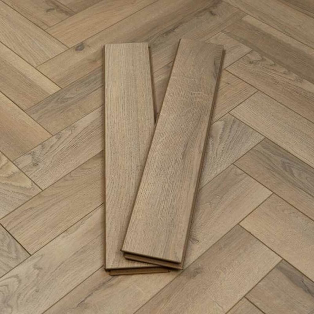 Evergreen Grey Oyster Herringbone Laminate Flooring, 100x12x600mm