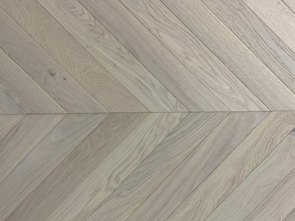 Xylo Pearl White Stained Engineered Oak Flooring, Rustic, Chevron, Brushed & UV Oiled, 90x14x540mm