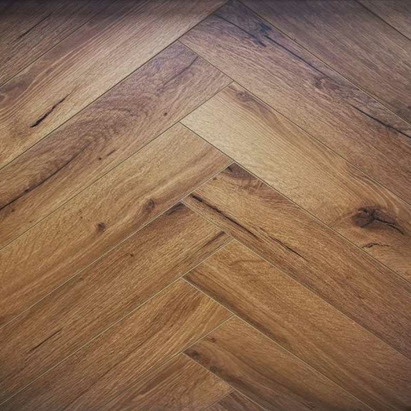Evergreen Smoked Oak Herringbone Laminate Flooring, 100x12x600mm Image