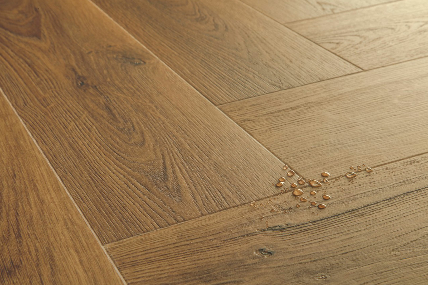 QuickStep Alpha Ciro, Botanic Caramel Oak Herringbone Vinyl Flooring, 126x6x630mm Image