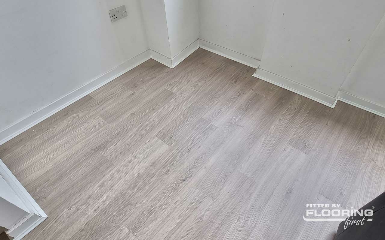 QuickStep ELIGNA Light Grey Varnished Oak Laminate Flooring 8mm Image
