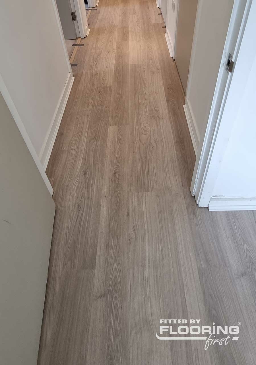 QuickStep ELIGNA Light Grey Varnished Oak Laminate Flooring 8mm Image