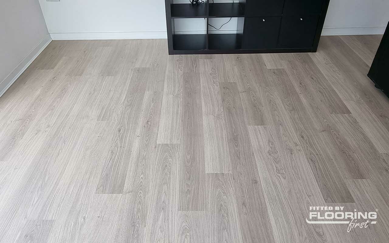 QuickStep ELIGNA Light Grey Varnished Oak Laminate Flooring 8mm Image